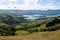 View over Akaroa from the green hills of Banks Peninsula