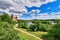 View over beautiful German city Aschaffenburg with Main river, palace called `Schloss Johannisburg` and green park