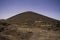 View over black lava field on cone of volcano - Timanfaya NP Lanzarote