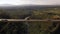 View over bridge from dron in the day