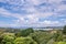 View over bush landscape to Ngunguru Harbour and beach in summer