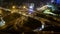 View over busy elevated road junction & skyline at dusk, Shanghai