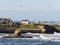 View over Collywell Bay with Charlie\\\'s Garden rock formation to Seaton Sluice and Blyth, Northumberland, UK