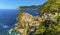 A view over the colourful village of Vernazza, from the path leading towards Corniglia