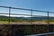 View over a dry stone wall towards lake or reservoir in the forest of Bowland