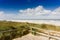 View over the dunes to the beach and the ocean