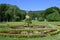 View over flowerbed at Castle Wilhelmhohe to Hercules monument, Wilhelmshoehe Mountainpark, Bergpark, Castle Park, Germany