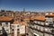 View over houses and roofs and Clerigos Tower in Porto, Portugal