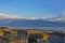 View over Lausanne roofs at sunset with lake Geneva and Alps