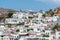 View over Lindos Town with rooftops. Greek Island of Rhodes. Whitewash houses. Europe