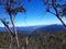 View over looking victorian high country framed by two trees