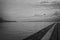 View over an old bathing jetty onto a mountain lake.