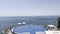 View over the pool on tourists parasailing in the sea