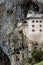 View over Predjama Castle and rocks, Slovenia