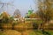 View over river and trees on ancient wind mills in dutch traditional nostalgic village Zaanse Schans, Netherlands