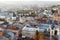 view over the roofs of houses in the old city of Lviv, a beautiful sunset light, European architecture