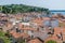 A view over the rooftops towards the Central Square and harbour from the cathedral above the town of Piran, Slovenia