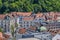 A view over rooftops towards riverside buildings from central Ljubljana