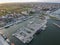 View over seaside town Paralia Katerini at Marina Olympic Coast. Aerial panorama of the sea stones, fishing boats and ships in