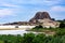 View over secluded lagoon sand beach on isolated rock on hill in tropical sea - Sri Lanka, Yala NP