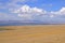 View over Song kol lake, steppe and surrounding mountains, Kyrgyzstan