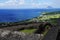 A view over St. Kitts and Sint Eustatius Islands with Brimstone Hill Fortress fortifications on the foreground on a bright sunny