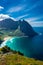 View over the turquoise water of Kvalvika Beach from Ryten Mount, Lofoten Islands,  Norway