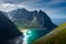 View over the turquoise water of Kvalvika Beach from Ryten Mount, Lofoten Islands,  Norway