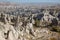 View over valley with cave houses, in Cappadocia,