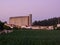 View over Vila do Conde, Portugal at dusk with old, abandoned Olive Oil refinery dominating horizon