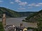 View over village Oberwesel, Germany with two historic towers, part of the old town wall, houses and Rhine river.