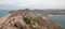 View of Pacific and Sea of Cortes and Cabo San Lucas marina as seen from the top of Mount Solmar in Baja California Mexico