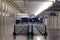 View at a pair of empty moving walkways in long hall of an airport