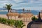 View of palapas on the beach in Marbella, Spain.