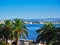 View Through Palm Trees to Loutraki, Greece