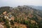 View from a paraglider to the valley and Lake Pheva in Pokhara, Himalayas. Rice fields, mountains and small houses. Tilt Shift Eff