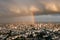 View of Paris from above. Rain, clouds, rainbow.