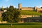 A view from a park to Kalemegdan fortress walls and towers at sunset, Belgrade