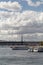 View of parked tour boats on Golden Horn part of Bosphorus and Halic bridge in Istanbul.