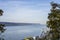 A view of part of a bridge and Hudson river with a few boats swimming around