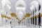 View of the passage through the arches of The Sheikh Zayed Grand Mosque with marble columns ornate with gold and mosaics pictures