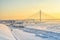 The view of the passenger port and Bolshoy Obukhovsky bridge at a frosty hazy winter day.