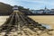 A view past the old Lifeboat station towards the harbour in Tenby, Pembrokeshire