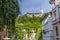 A view past ornate buildings towards the Castle in Ljubljana