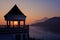 A view pavilion beside the Mekong River with morning sunrise and beautiful mountains