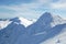 View of the peak of the snow-covered Chopok mountain and the Low Tatras mountain range in the ski resort Jasna, Slovakia