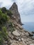 View of Pedra Longa, limestone rock pillar at coast Gulf of Orosei, beginning of the famous and difficult hiking