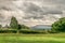 A view of Pendle Hill and gathering rain clouds.