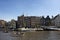 View of people riding open boats in Amstel river