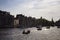 View of people riding open boats in Amstel river